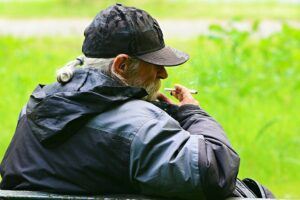 man smoking cigarette